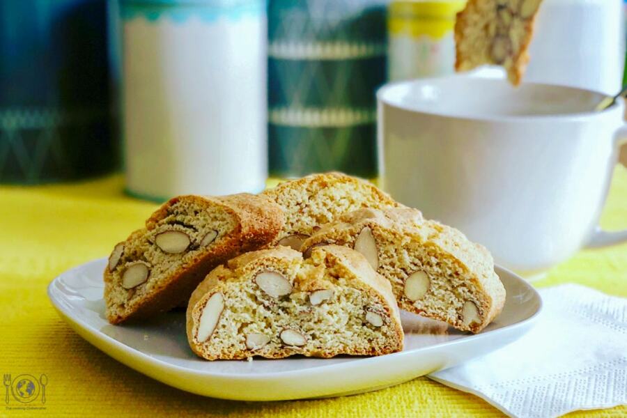 Cantucci are dairy free Italian biscotti filled with almonds and ideal to dip in your coffee, tee or wine! Yes, wine! Find out why...